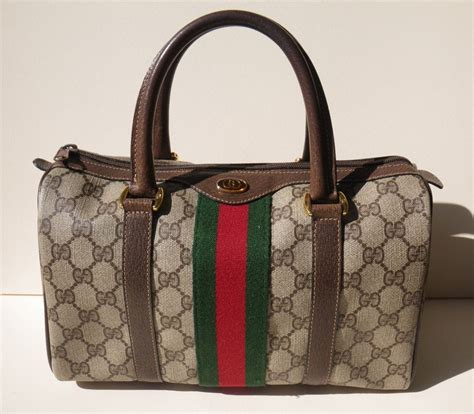 authenticating vintage gucci|pictures of vintage Gucci handbags.